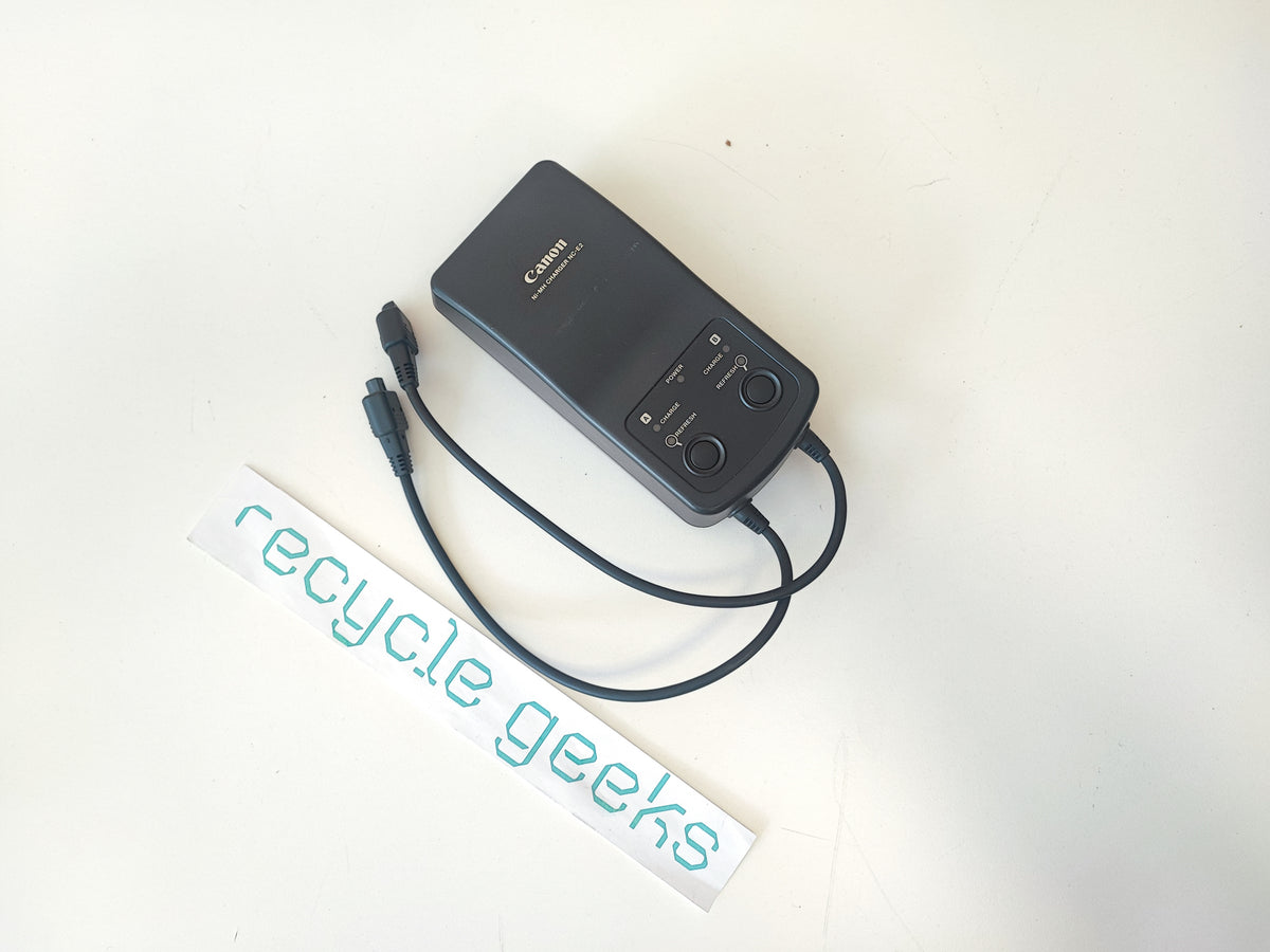 Carregador Original de Baterias Canon Ni-MH Charger NC-E2 (black) — Condição: Muito Bom