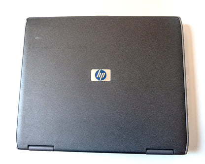 HP NX9030 Notebook, Pentium M 1.7 GHz, 480 MB RAM, 60 GB HDD, with charger and battery.